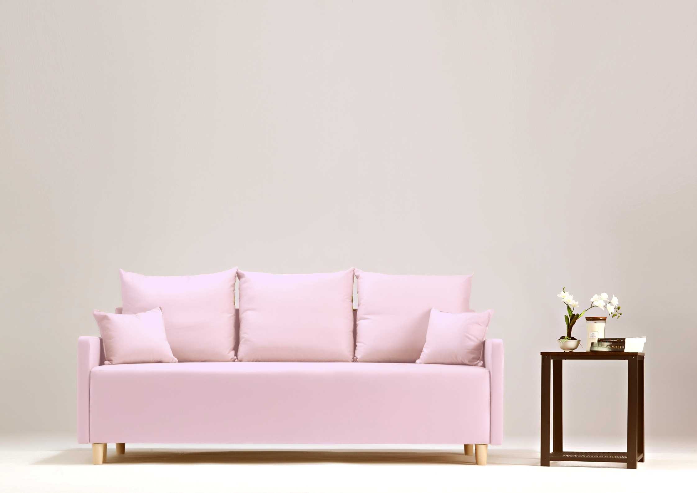 Różowa skandynawska sofa rozkładana 